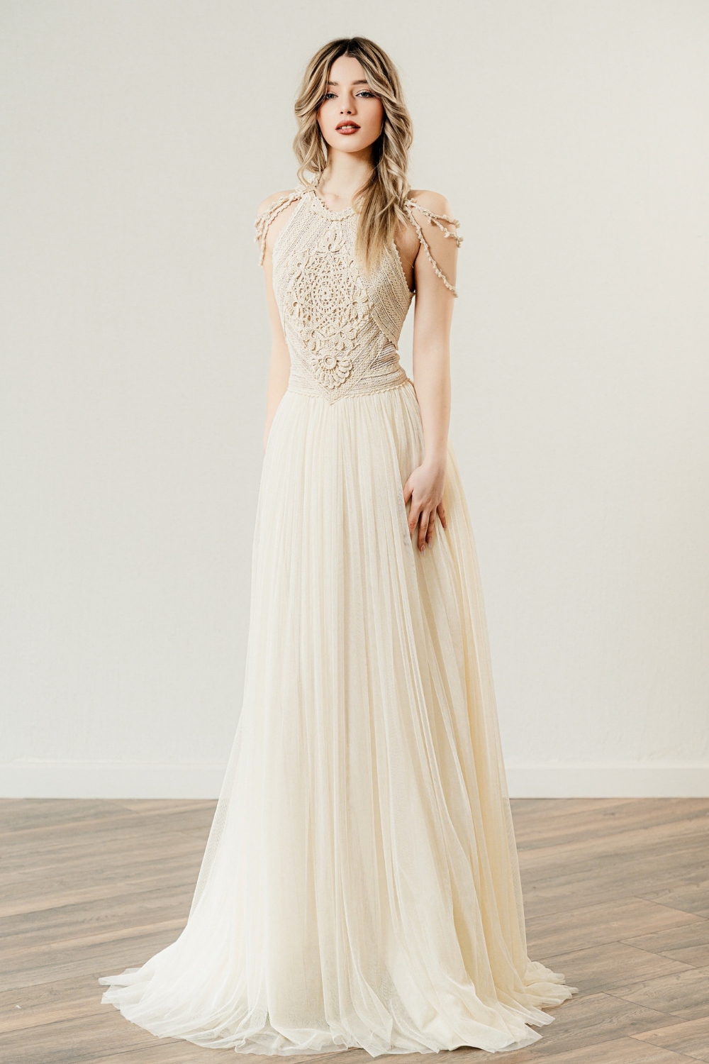 Blonde model in one of the Crochet Wedding Dresses by Atelier Zolotas, called 'Amarantha'