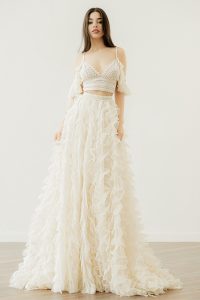 Model in the 'Eleanor' vintage lace crop top wedding dress by Atelier Zolotas