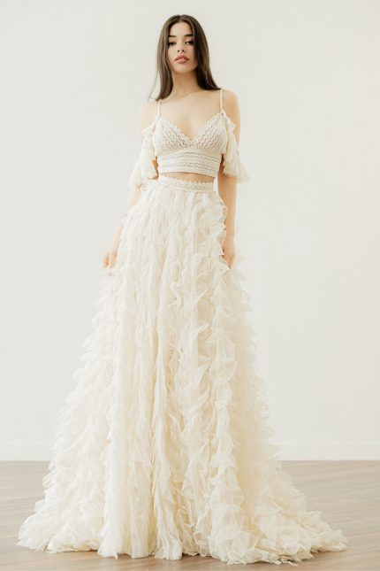 Model in the 'Eleanor' vintage lace crop top wedding dress by Atelier Zolotas