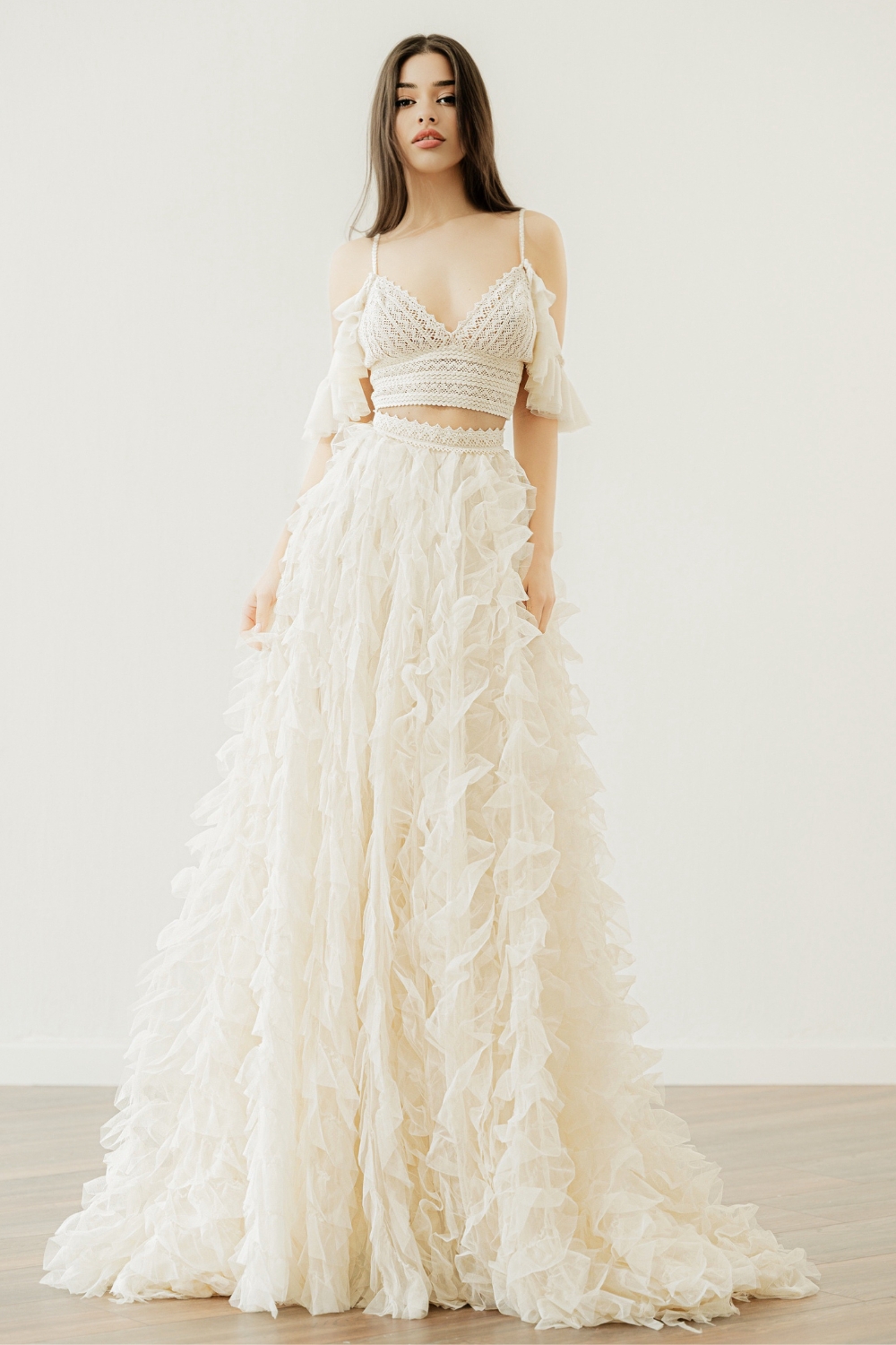 Model in the 'Eleanor' vintage lace crop top wedding dress by Atelier Zolotas