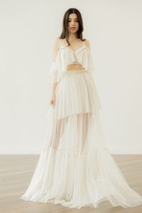 Off-the-shoulder crop top wedding dress 'Emery' paired with 'Elira' skirt by Atelier Zolotas