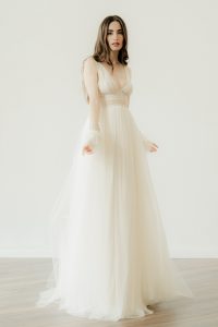 Model in the 'Hope' chantilly lace wedding dress by Atelier Zolotas