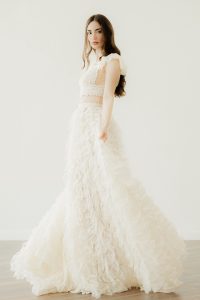 Model in 'Lysie', a convertible wedding dress crop top by Atelier Zolotas