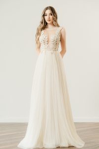 Bride in an ethereal crochet wedding dress by Atelier Zolotas