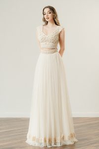 Theoni A line is one of the most popular Crop top wedding dresses of the Zolotas house