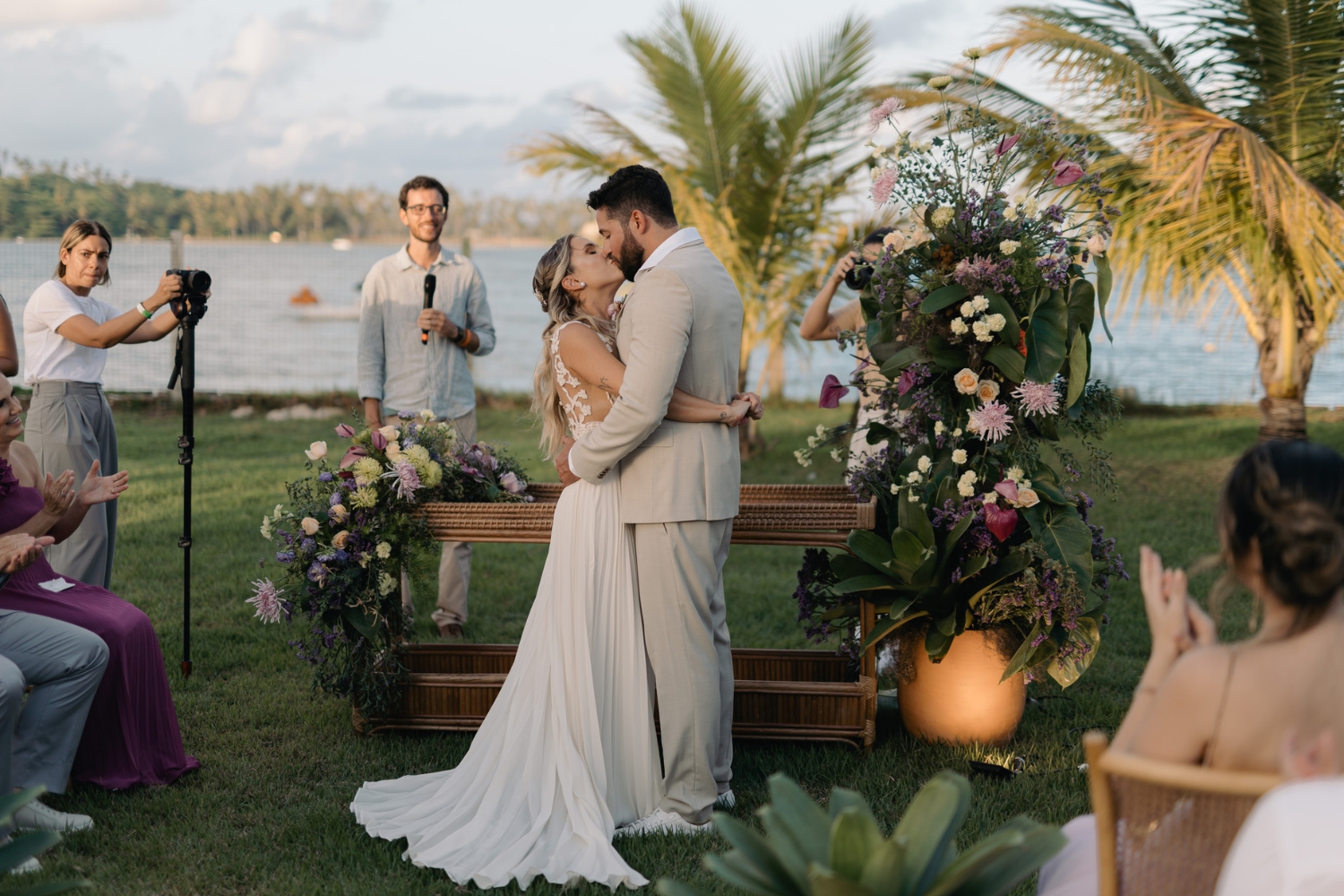 Wedding in Praia dos Carneiros, Brazil, bride and groom kissing during the wedding cerimony